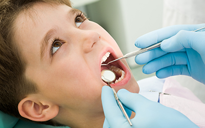 A young boy in a dental office